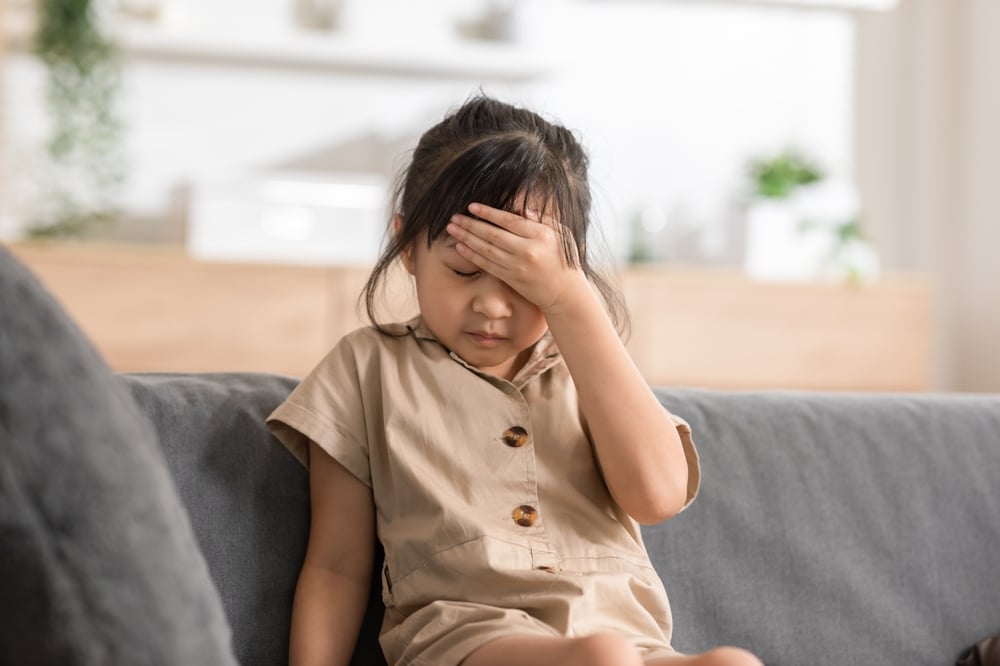 asian kid feel sick unwell