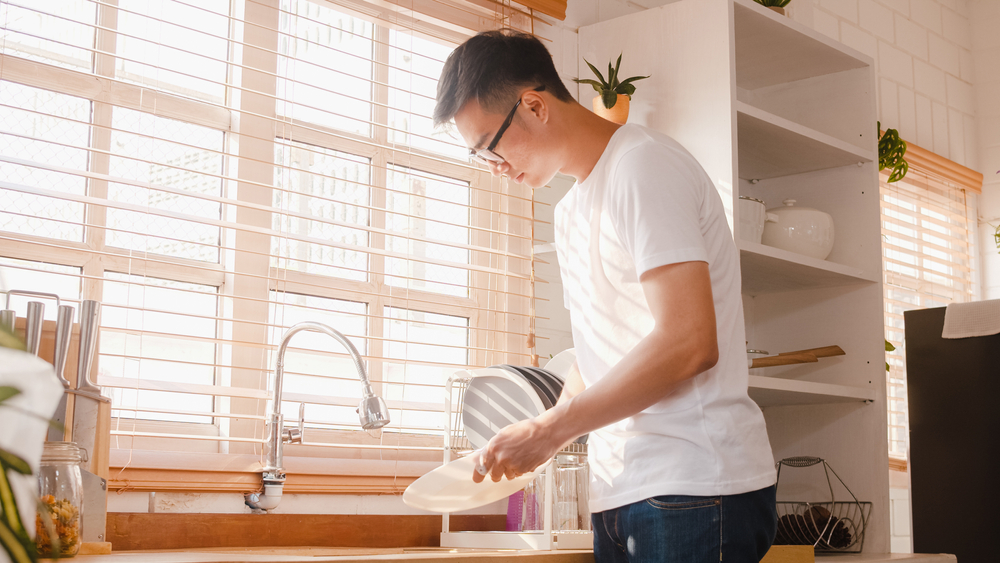 man doing chores